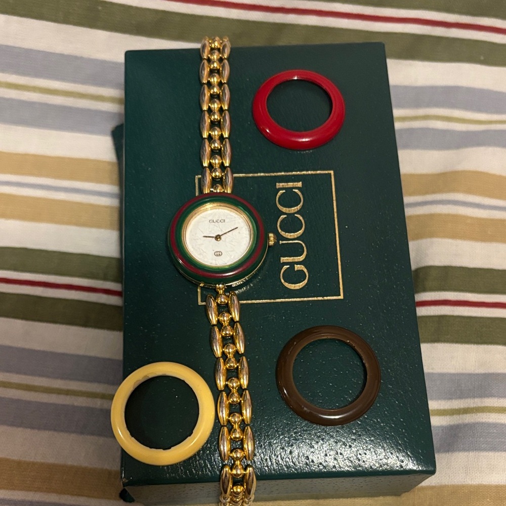 Gucci Women's Gold Watch with Red, Cream, and Brown Bezels